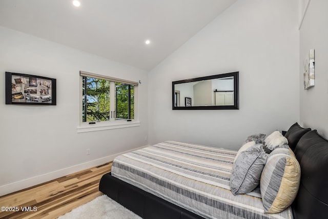 5780 Wildridge Rd E Unit A, Avon, CO 81620 - bedroom featuring wood finished floors, recessed lighting, baseboards, and high vaulted ceiling
