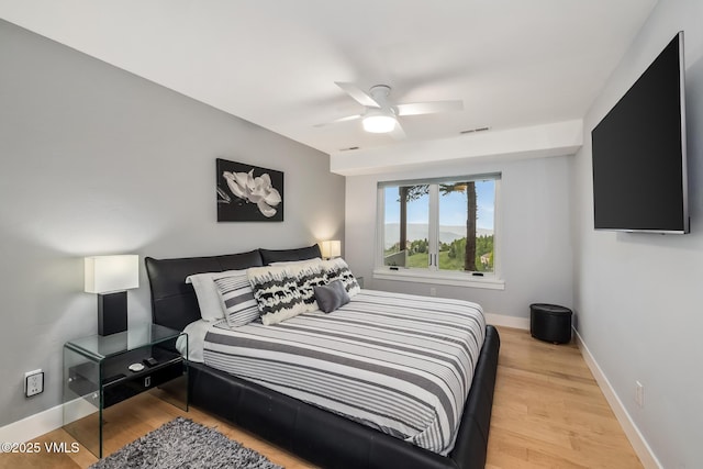 5780 Wildridge Rd E Unit A, Avon, CO 81620 - bedroom featuring wood finished floors, baseboards, and a ceiling fan