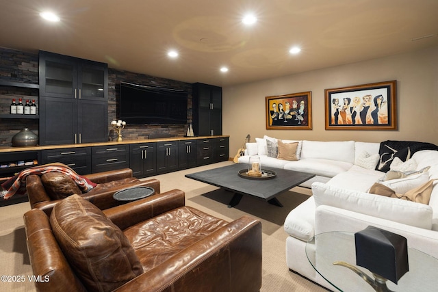 living room with light colored carpet and recessed lighting