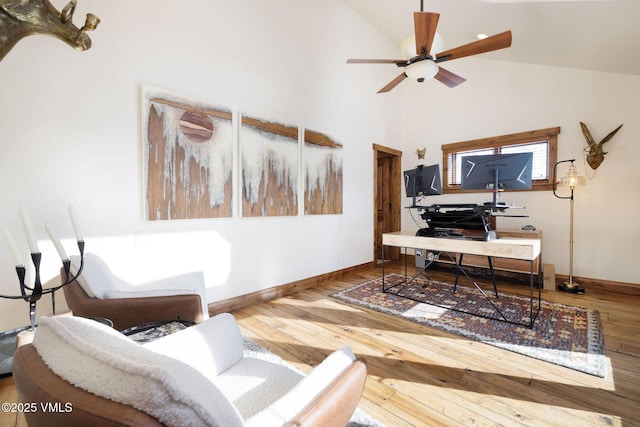 office with high vaulted ceiling, ceiling fan, baseboards, and wood finished floors