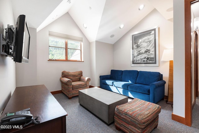 living room with lofted ceiling and dark colored carpet