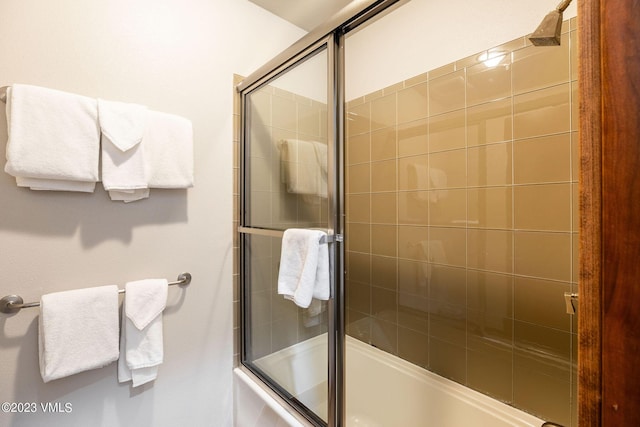 bathroom featuring enclosed tub / shower combo