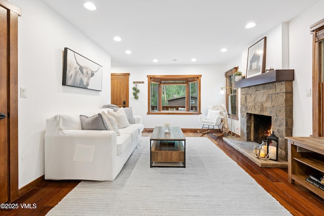 4254 Columbine Way Unit 9, Vail, CO 81657 - living room featuring a fireplace, dark wood-style floors, and recessed lighting