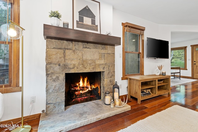 4254 Columbine Way Unit 9, Vail, CO 81657 - detailed view of a stone fireplace and wood finished floors