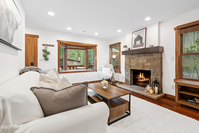 4254 Columbine Way Unit 9, Vail, CO 81657 - living area featuring wood finished floors, a fireplace, and recessed lighting