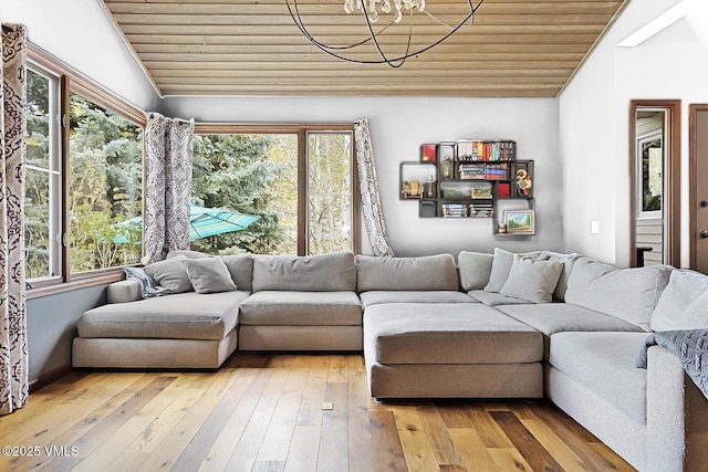 961 June Creek Rd, Edwards, CO 81632 - living room featuring lofted ceiling, wooden ceiling, plenty of natural light, a chandelier, and light wood-style floors