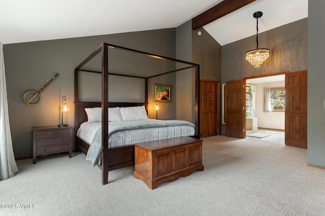 961 June Creek Rd, Edwards, CO 81632 - bedroom featuring light carpet, high vaulted ceiling, a chandelier, and beam ceiling