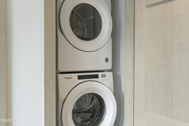 42 Riverfront Ln Unit 304, Avon, CO 81620 - washroom featuring estacked washer and dryer