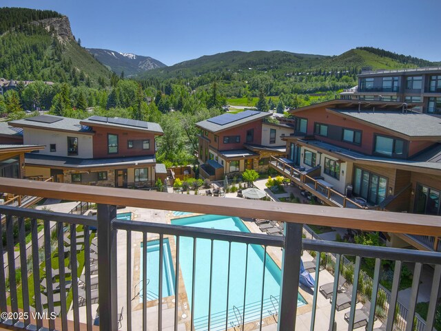 42 Riverfront Ln Unit 304, Avon, CO 81620 - view of mountain backdrop with a forest