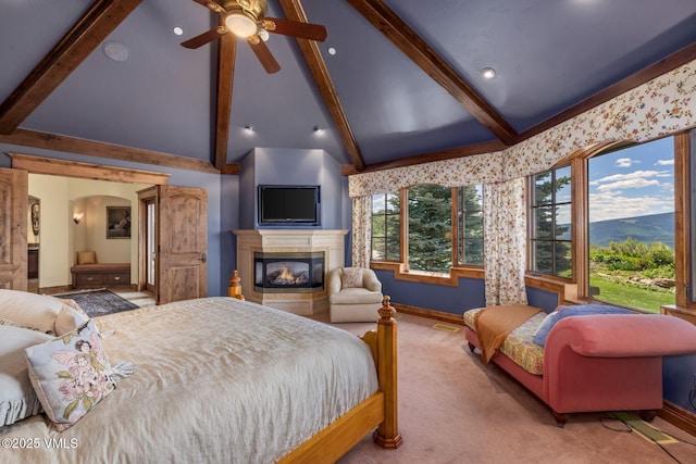 1006 Chiming Bells, Avon, CO 81620 - bedroom featuring beamed ceiling, a multi sided fireplace, carpet flooring, and high vaulted ceiling