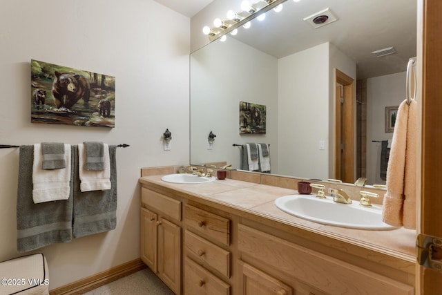 bathroom with double vanity