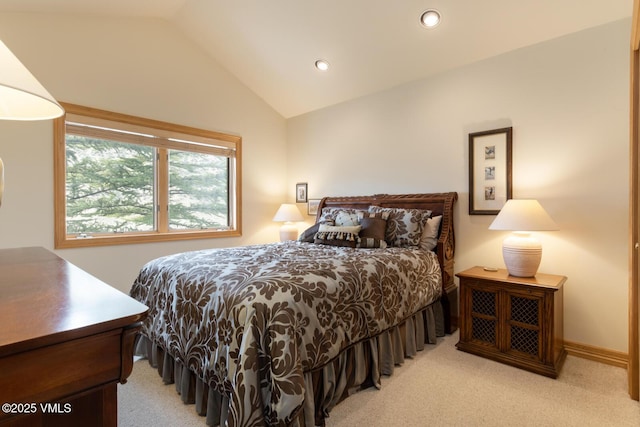 bedroom featuring vaulted ceiling, light colored carpet, and recessed lighting