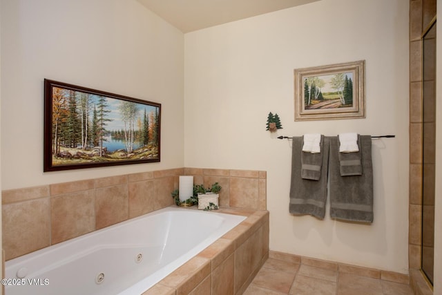 bathroom featuring a tub with jets