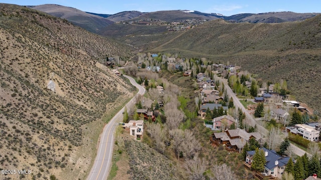 840 June Creek Rd S, Edwards, CO 81632 - aerial view of property's location featuring a mountainous background and nearby suburban area