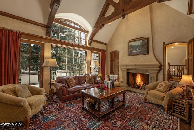 443 Beaver Dam Rd, Vail, CO 81657 - living area with high vaulted ceiling, a large fireplace, and arched walkways
