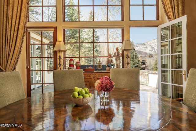 443 Beaver Dam Rd, Vail, CO 81657 - dining space featuring healthy amount of natural light and a towering ceiling