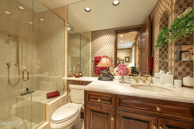 443 Beaver Dam Rd, Vail, CO 81657 - bathroom featuring wallpapered walls, toilet, vanity, a shower stall, and recessed lighting