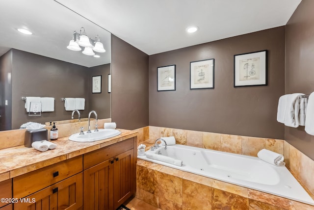 205 Bear Paw Unit B102, Avon, CO 81620 - bathroom featuring a jetted tub and vanity