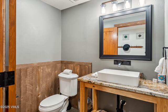 205 Bear Paw Unit B102, Avon, CO 81620 - half bath featuring vanity and toilet