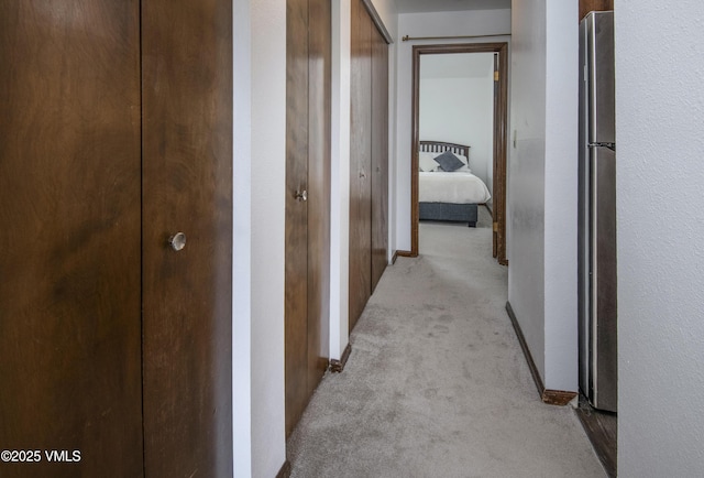 1061 W Beaver Creek Blvd Unit Q302, Avon, CO 81620 - hallway with light colored carpet and baseboards
