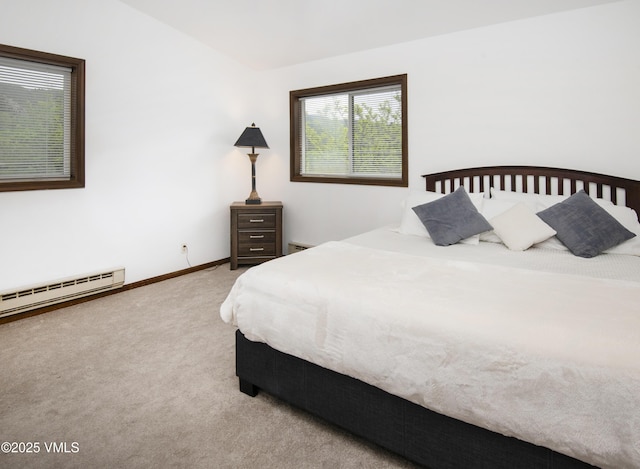 1061 W Beaver Creek Blvd Unit Q302, Avon, CO 81620 - carpeted bedroom featuring a baseboard heating unit and baseboards