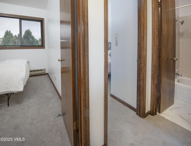 1061 W Beaver Creek Blvd Unit Q302, Avon, CO 81620 - corridor featuring baseboard heating and carpet flooring