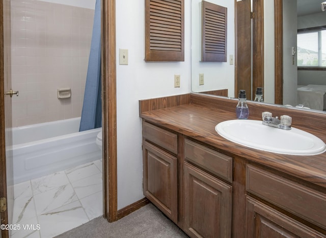 1061 W Beaver Creek Blvd Unit Q302, Avon, CO 81620 - full bath with vanity, marble finish flooring, shower / bathtub combination with curtain, and toilet