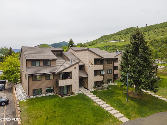 1061 W Beaver Creek Blvd Unit Q302, Avon, CO 81620 - view of building exterior featuring a mountain view