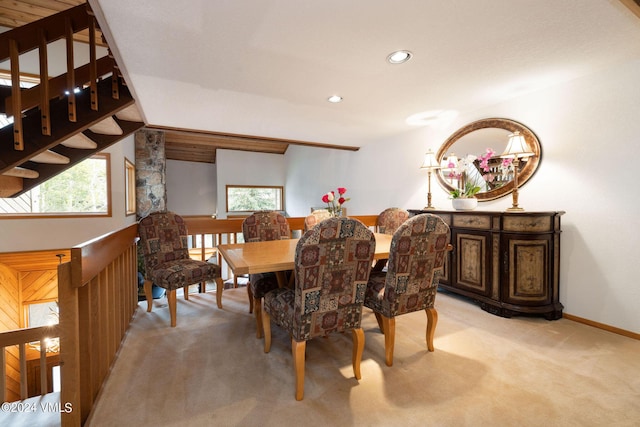 view of carpeted dining space