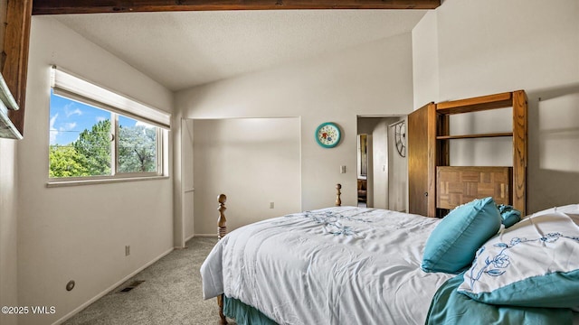 541 20 1/2 Rd, Grand Junction, CO 81505 - bedroom featuring light colored carpet, lofted ceiling, and a textured ceiling