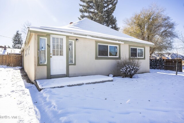 432 W Fifth St, Eagle, CO 81631 - view of front of property with stucco siding and fence