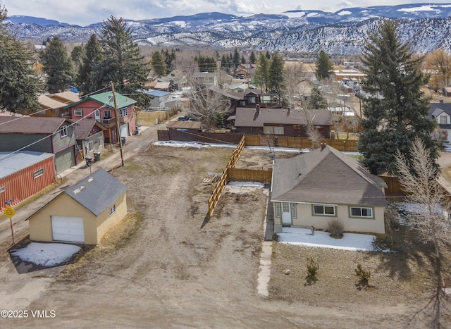 drone / aerial view with a mountain view and a residential view