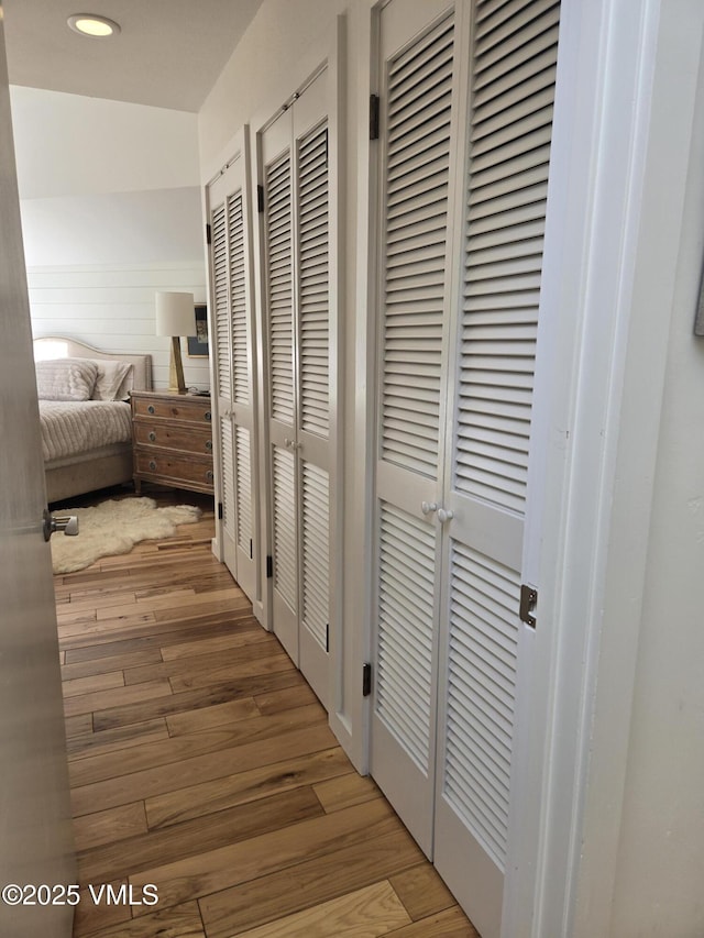 corridor featuring hardwood / wood-style floors