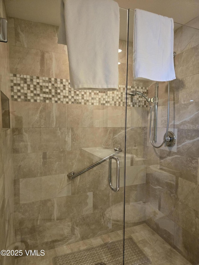 bathroom with an enclosed shower