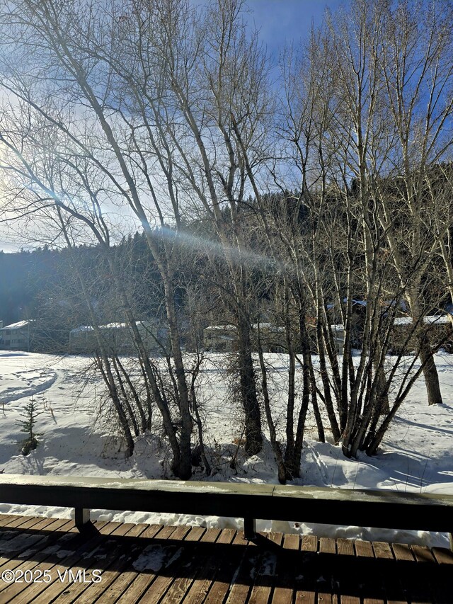 view of snow covered deck