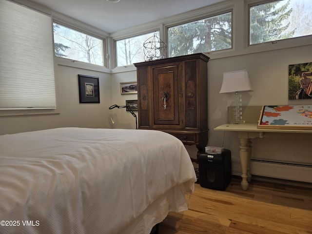 bedroom with light wood-type flooring