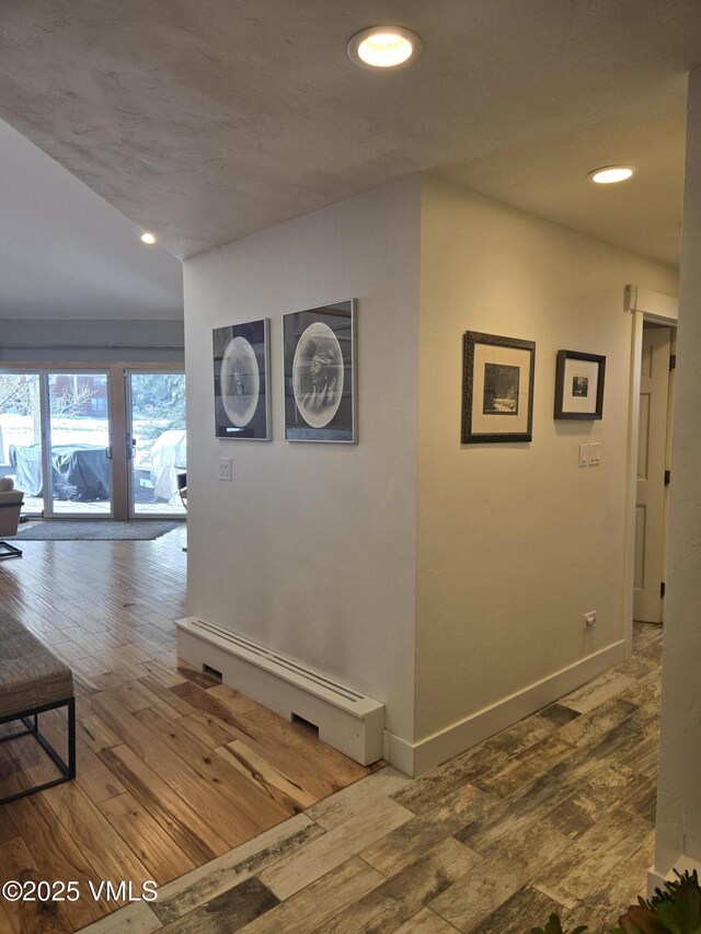 hallway featuring hardwood / wood-style flooring