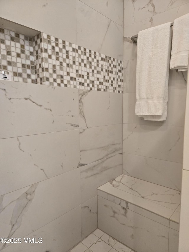358 Stone Creek Dr Unit 1, Eagle-Vail, CO 81620 - bathroom with marble finish floors and a tile shower