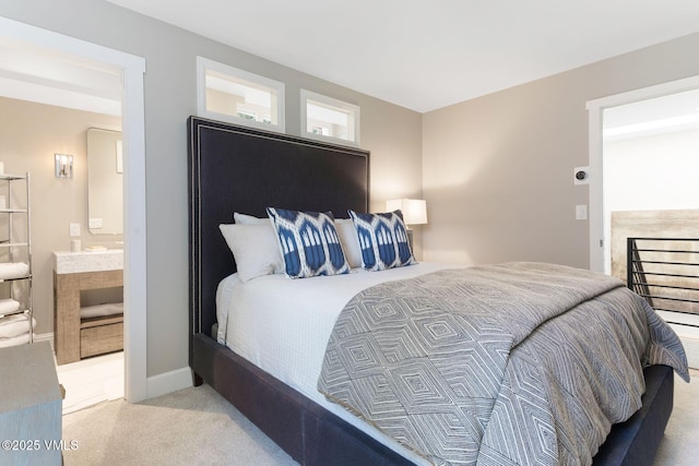 114 Mission Pl, Edwards, CO 81632 - bedroom with light carpet and ensuite bath