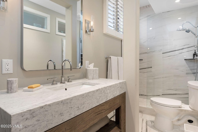 114 Mission Pl, Edwards, CO 81632 - bathroom featuring vanity, toilet, and a tile shower
