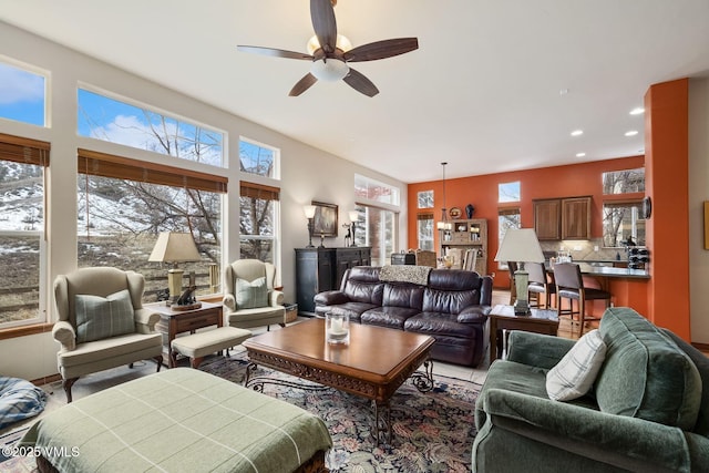 living room with a ceiling fan and recessed lighting