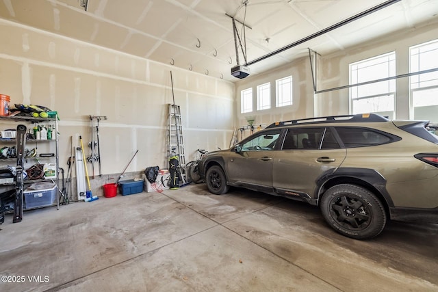 garage featuring a garage door opener