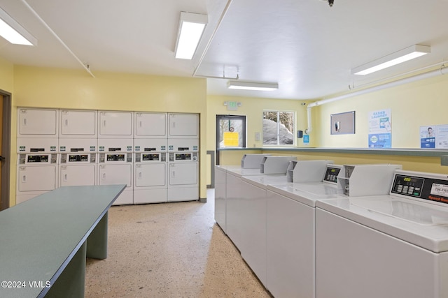 laundry room with stacked washer / dryer and washer and dryer