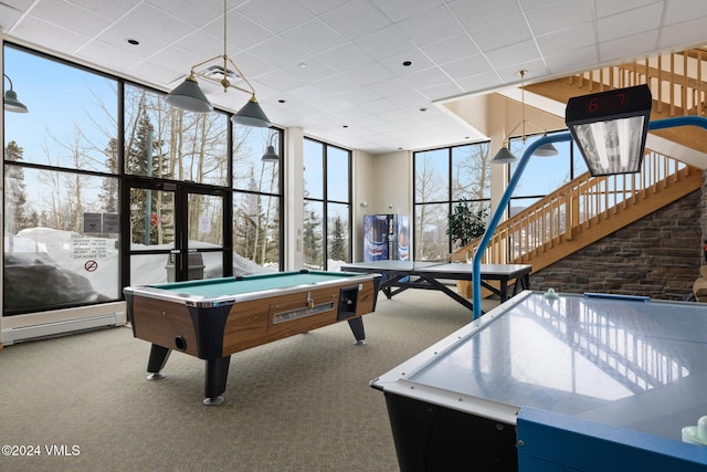 recreation room with carpet, a drop ceiling, a wall of windows, and billiards