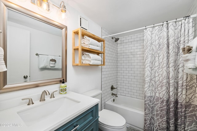 full bathroom featuring shower / tub combo with curtain, vanity, and toilet