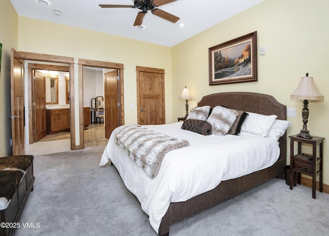 295 Main St Unit R-306, Edwards, CO 81632 - bedroom featuring light carpet, a sink, ensuite bathroom, and a ceiling fan