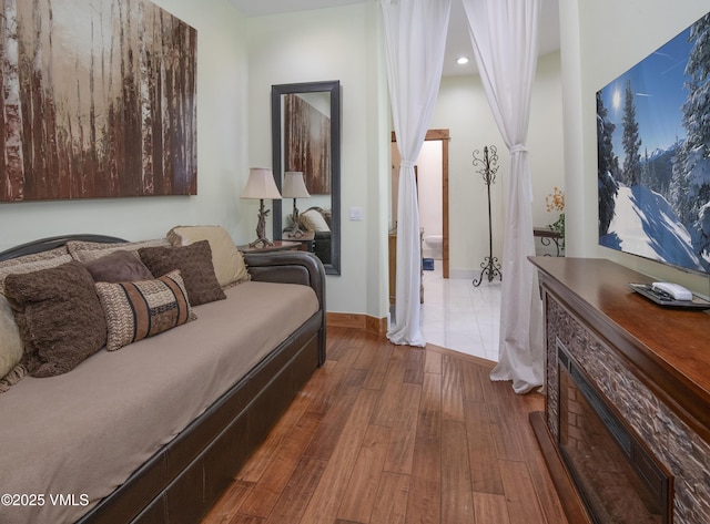 295 Main St Unit R-306, Edwards, CO 81632 - living room with wood-type flooring and baseboards