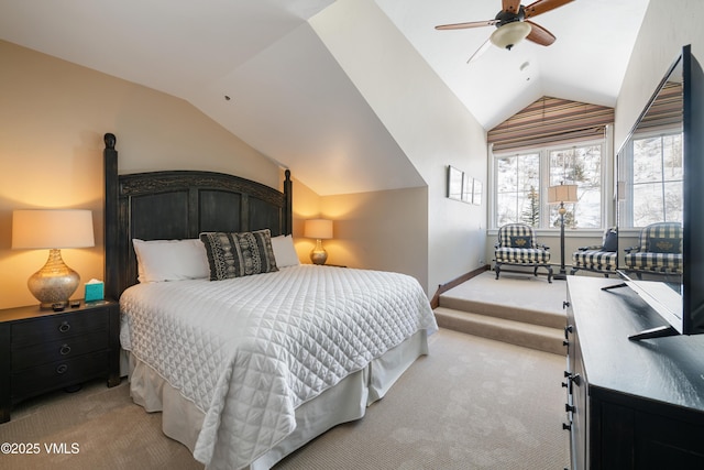 carpeted bedroom featuring ceiling fan and vaulted ceiling