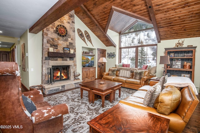 living room featuring a fireplace, beam ceiling, high vaulted ceiling, and wooden ceiling