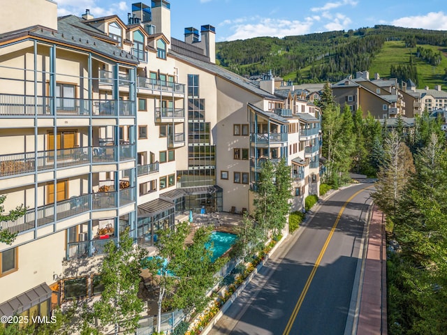 view of building exterior featuring a mountain view